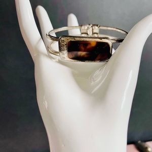 Vintage Guess silver tone cuff bracelet with faux tiger eye